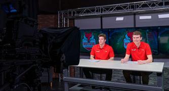 Image of students producing a television show in the TV studio.